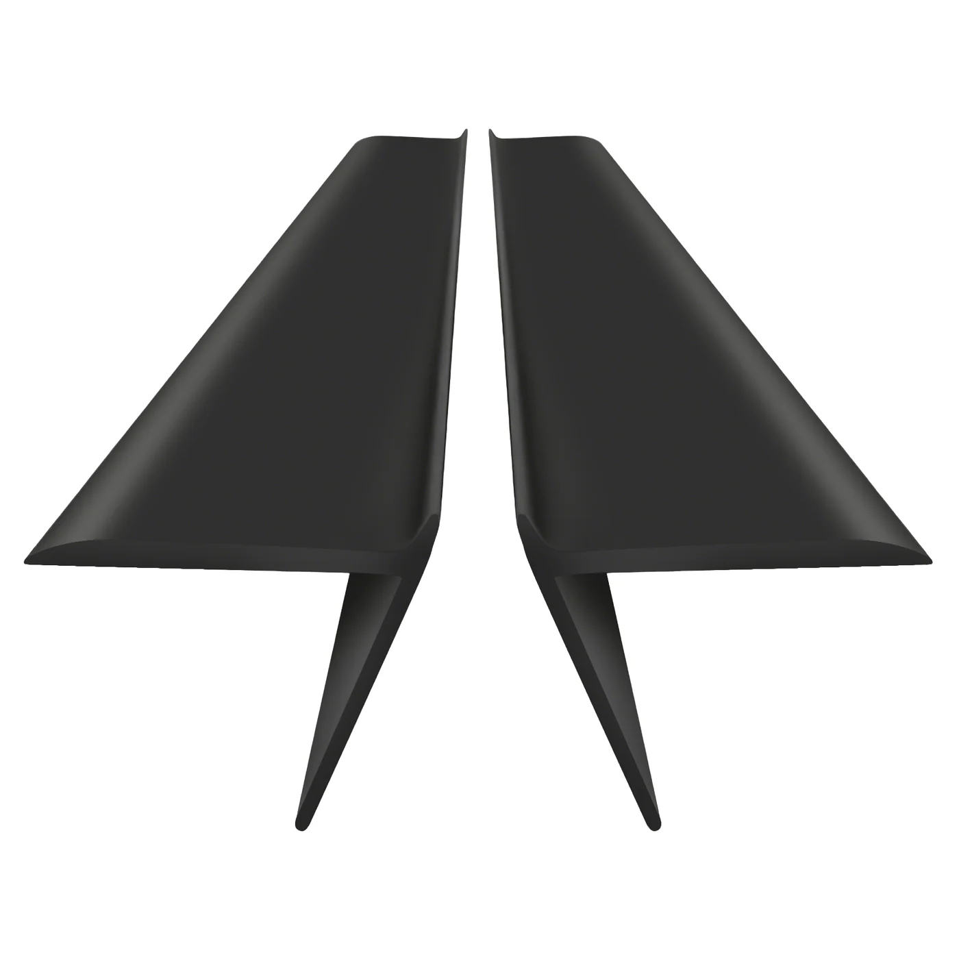 Two black FlexBridge silicone stove gap covers showing the extended bridge surface and lower support rib