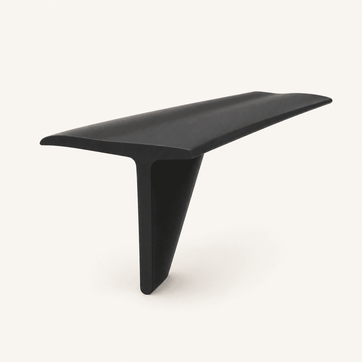 Black FlexBridge T-shaped profile used to bridge a stove and counter gap